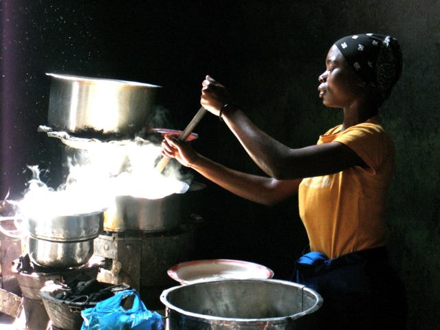 Cooking ugali over an open fire, the East African way