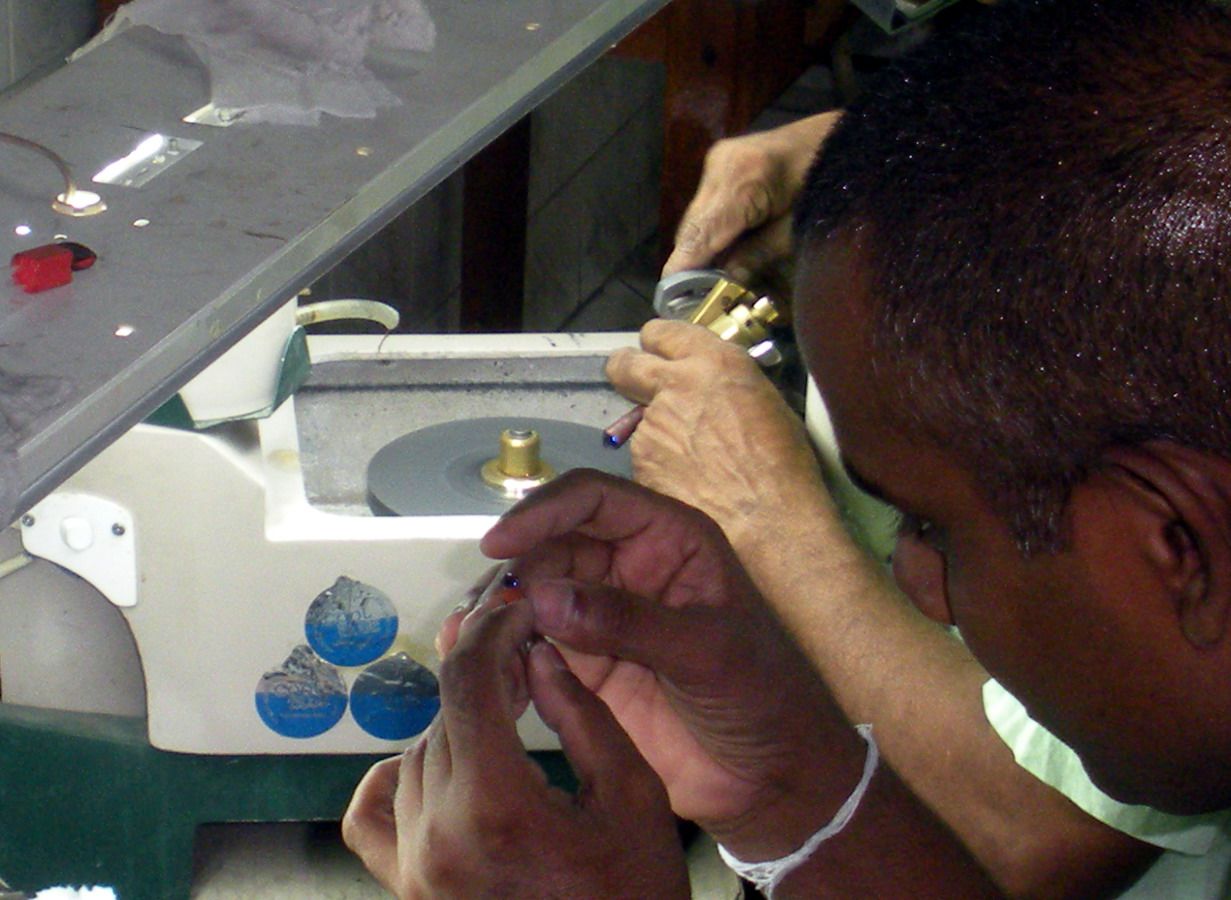 Cutting and polishing gemstones by hand, northern Tanzania